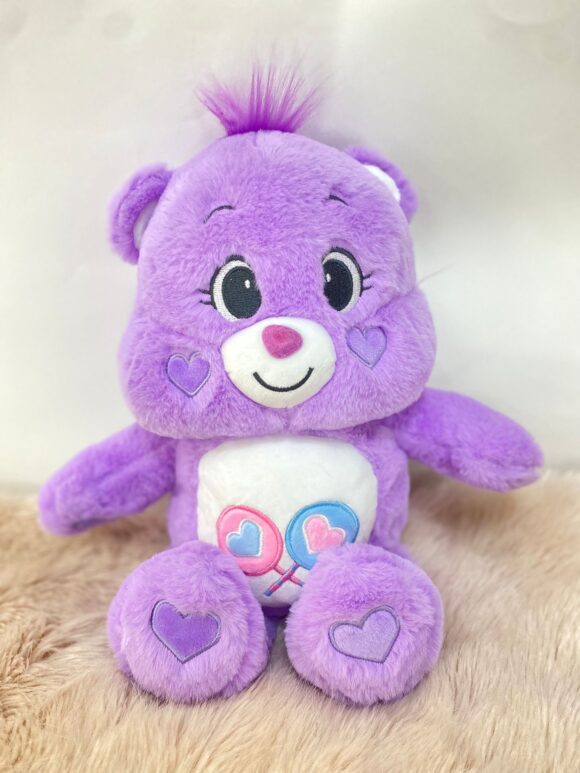 Peluche osito cariñosito en lila, rosa y azul