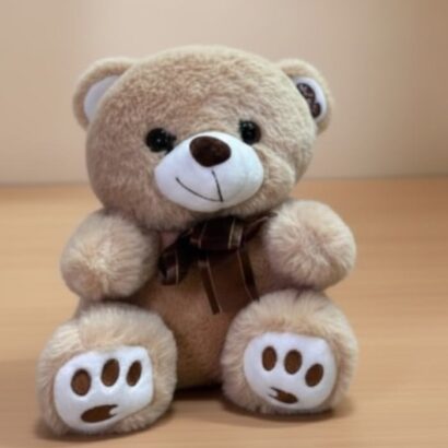 ositos de peluche marrón claro con lazos