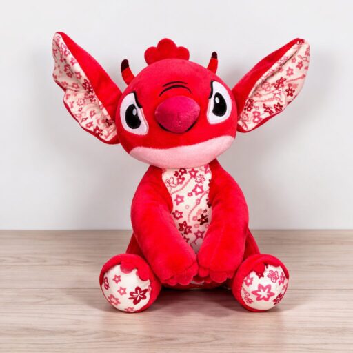 peluche alienígena rojo estrellas