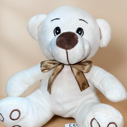 peluche osito blanco con lazo dorado