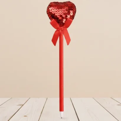 Bolígrafo con corazón de lentejuelas reversibles.