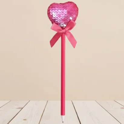 Bolígrafo con corazón de lentejuelas reversibles.