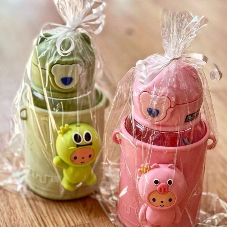 Botellas para bebé con muñecos de silicona