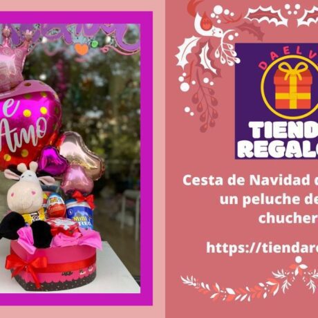 Cesta de Navidad de corazones, un peluche de jirafa y chucherías.