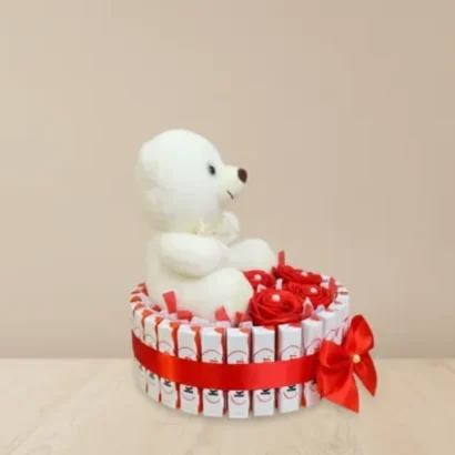 Cesta de kinder bueno y peluche regalo