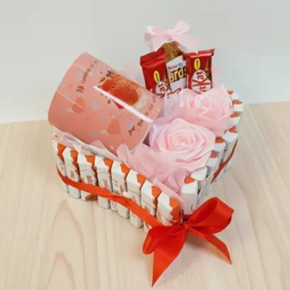 Corazón de kinder y taza de amor