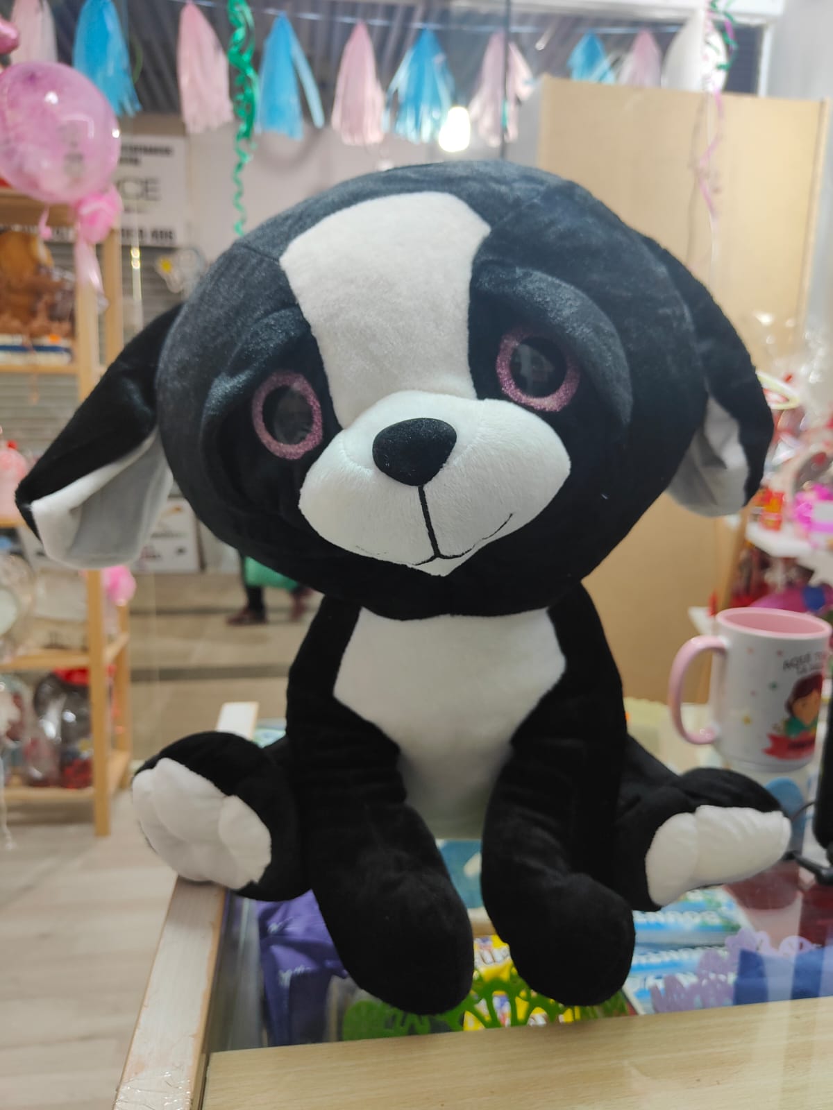 Peluche mediano de perro negro