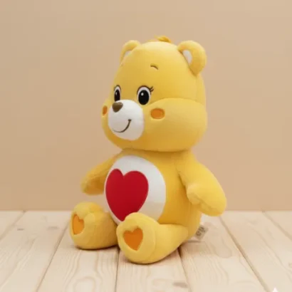 Peluche Care Bear Amarillo con Corazón