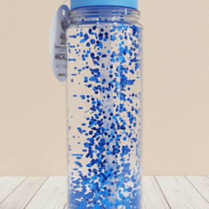 botella transparente con purpurina azul