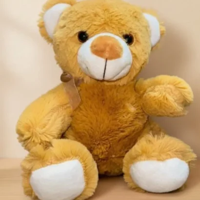 osito de peluche suave y esponjoso con lazo marrón