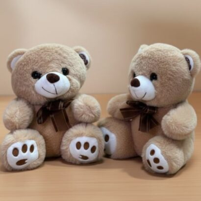 ositos de peluche marrón claro con lazos