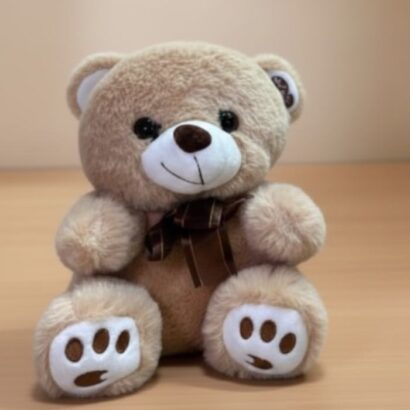 ositos de peluche marrón claro con lazos