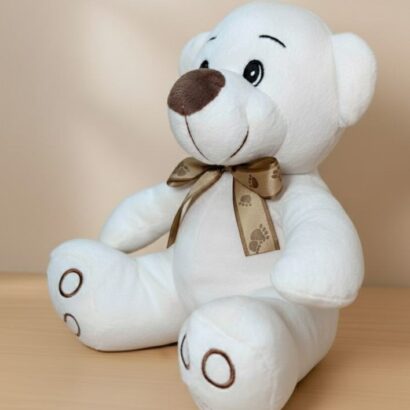peluche osito blanco con lazo dorado
