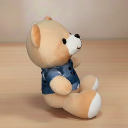 peluche osito con ropa azul y estampado de panda