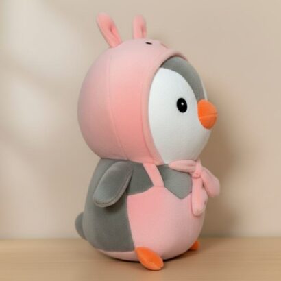 peluche pingüino con capucha rosa